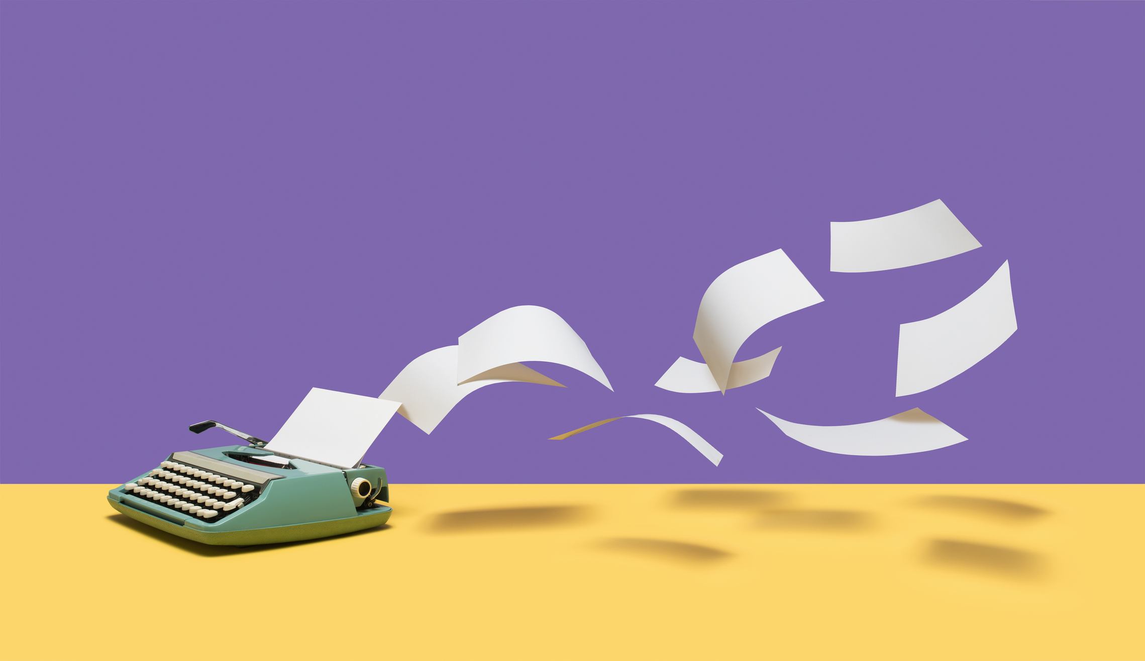 Sheets of blank white paper flying out of vintage, manual typewriter on yellow surface, purple background
