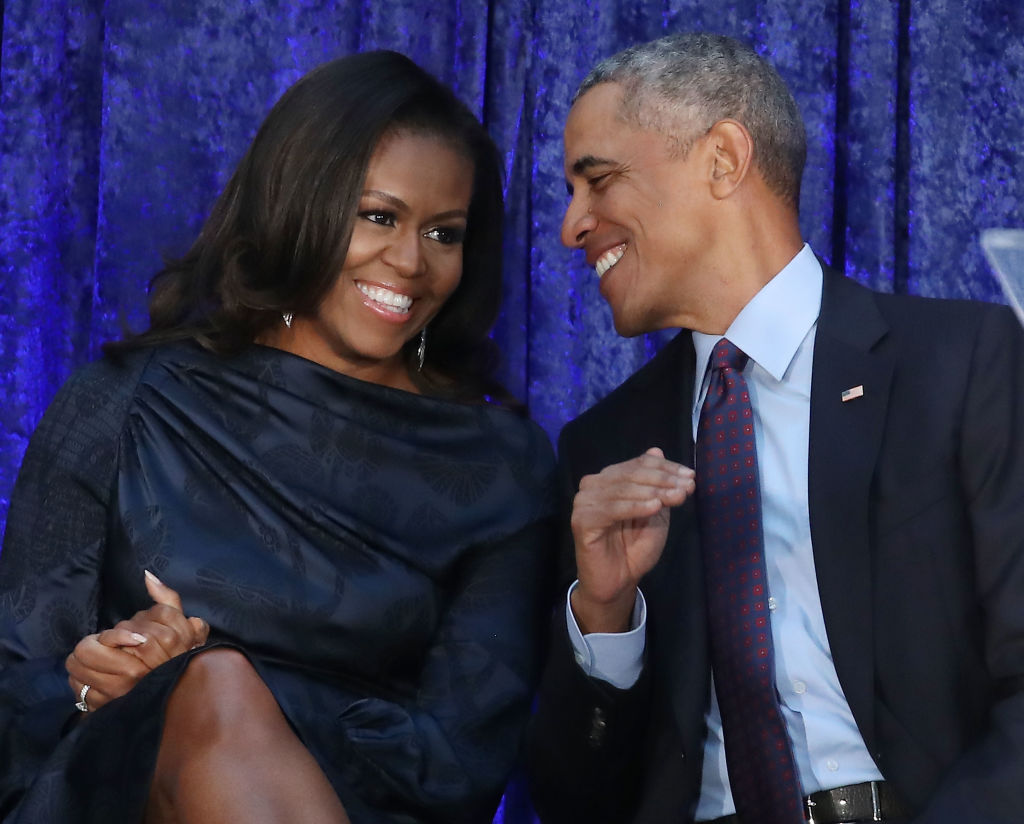 WASHINGTON, DC - FEBRUARY 12:  Former U.S. President Barack Obama and first lady Michelle Obama participate in the unveiling of their official portraits during a ceremony at the Smithsonian&#039;s National Portrait Gallery, on February 12, 2018 in Washington, DC. The portraits were commissioned by the Gallery, for Kehinde Wiley to create President Obama&#039;s portrait, and Amy Sherald that of Michelle Obama.  (Photo by Mark Wilson/Getty Images)