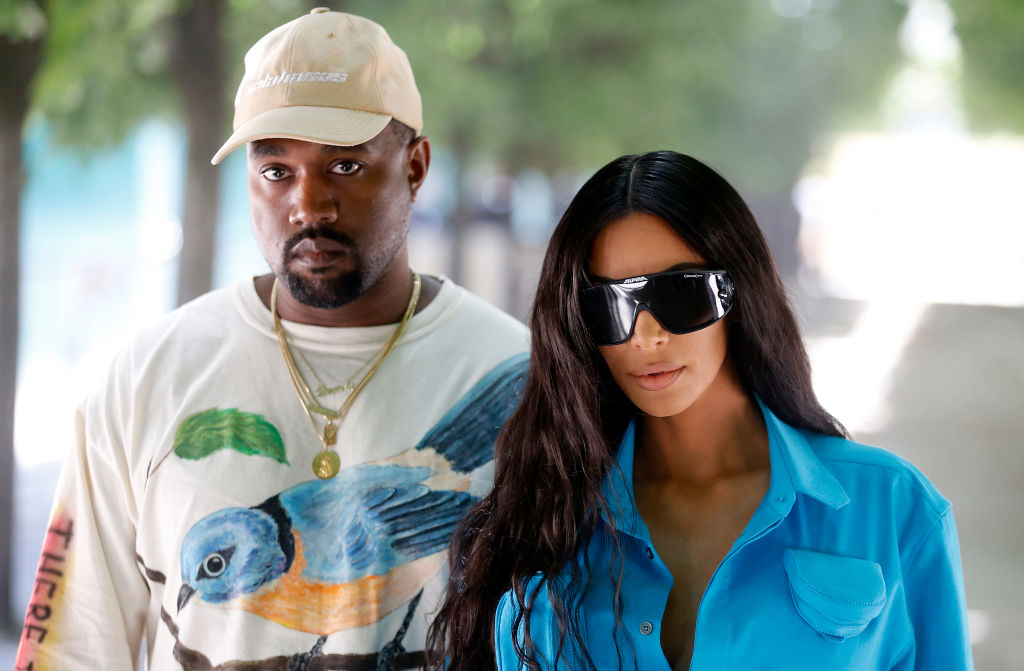PARIS, FRANCE - JUNE 21:  Kanye West and Kim Kardashian attend the Louis Vuitton Menswear Spring/Summer 2019 show as part of Paris Fashion Week Week on June 21, 2018 in Paris, France.  (Photo by Chesnot/WireImage)
