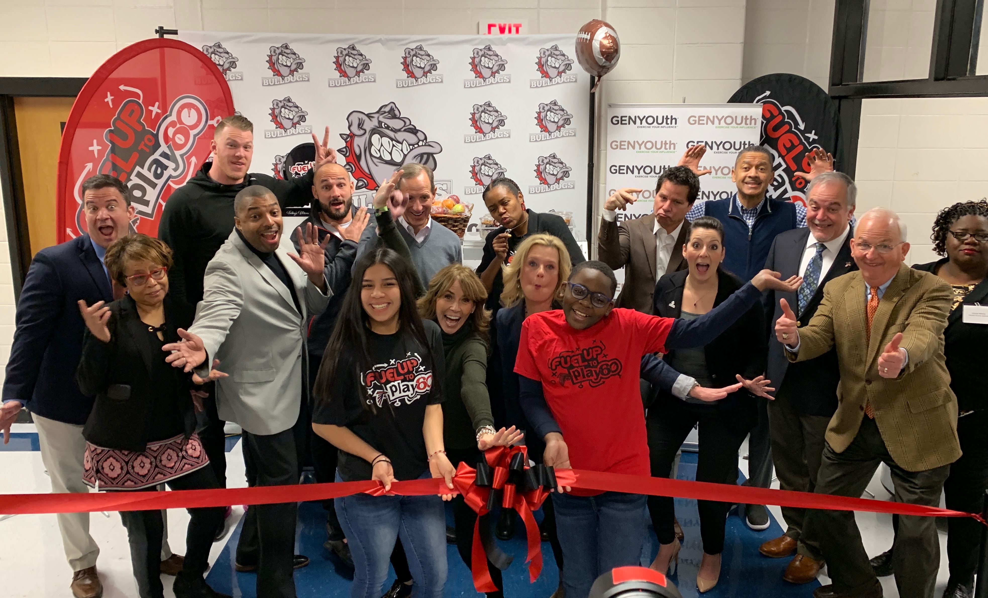 Alexis Glick, CEO, GENYOUth joins business and community leaders at a school in Atlanta to launch the first of 53 Fuel Up to Play 60 Grab-n-go breakfast carts. 