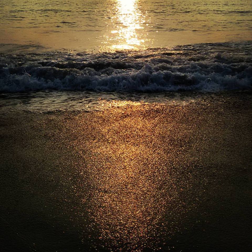 Every time I see the sunrise, I am grateful that I am alive. Captured this shimmering golden  sunset in Goa, India.
