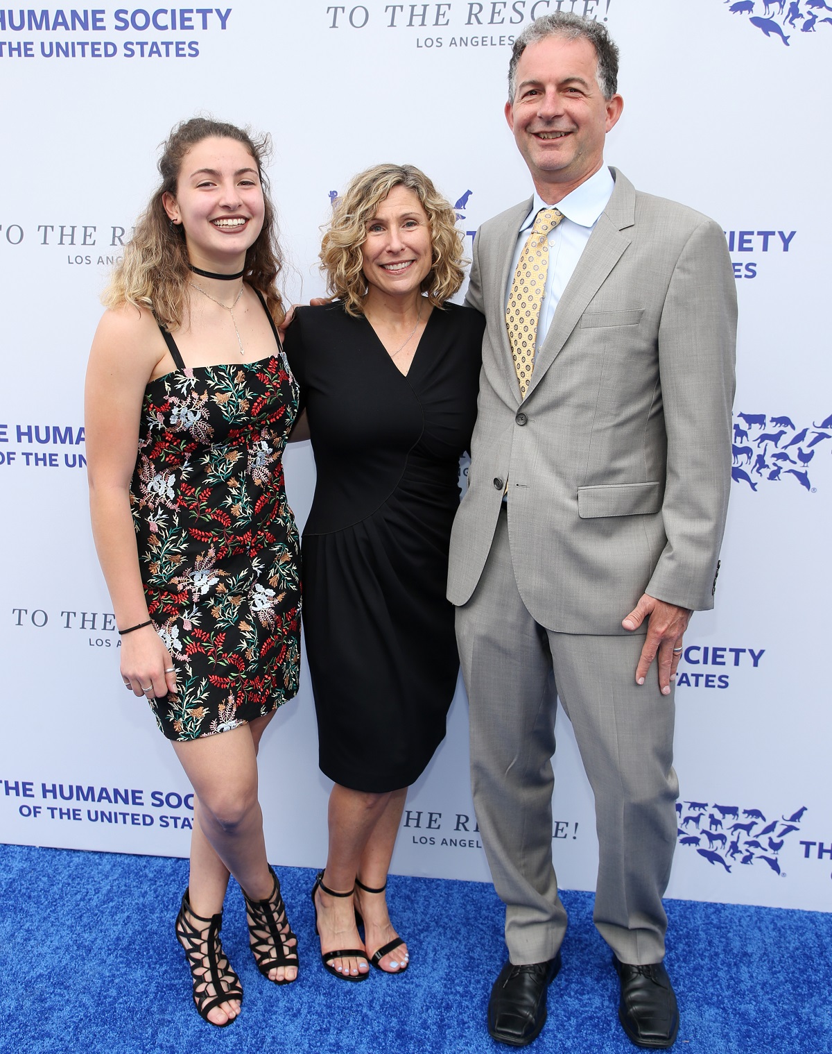 Kitty Block, president and chief executive officer of The Humane Society of the United States, center, and family walk the red carpet at the Humane Society of the United States&#039; To the Rescue! Los Angeles gala. The gala was held Saturday, April 21, 2018 at Paramount Studios and benefitted the HSUS&#039; Farm Animal Protection campaign. Competitive Surfer Conrad Carr, undercover investigators Whitney Warrington and Mary Beth Sweetland, and law firm Latham &amp; Watkins, LLP were honored at the event, which featured performances by Moby. (Photo by (Danny Moloshok/Invision for The Humane Society of the United States/AP Images)