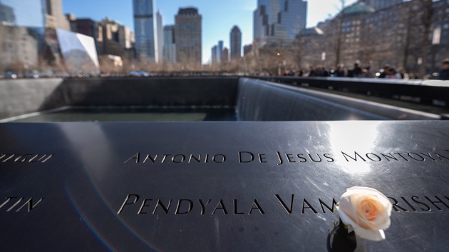 Tourists are visiting 9/11 Memorial. National September 11 Memorial site in Lower Manhattan, New York City, Manhattan, USA.