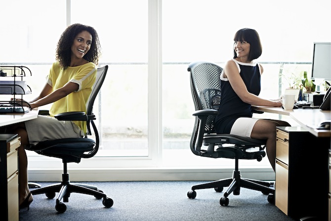 Female coworkers laughing (Source:https://www.canadianbusiness.com/blogs-and-comment/office-friendships-richard-branson/)