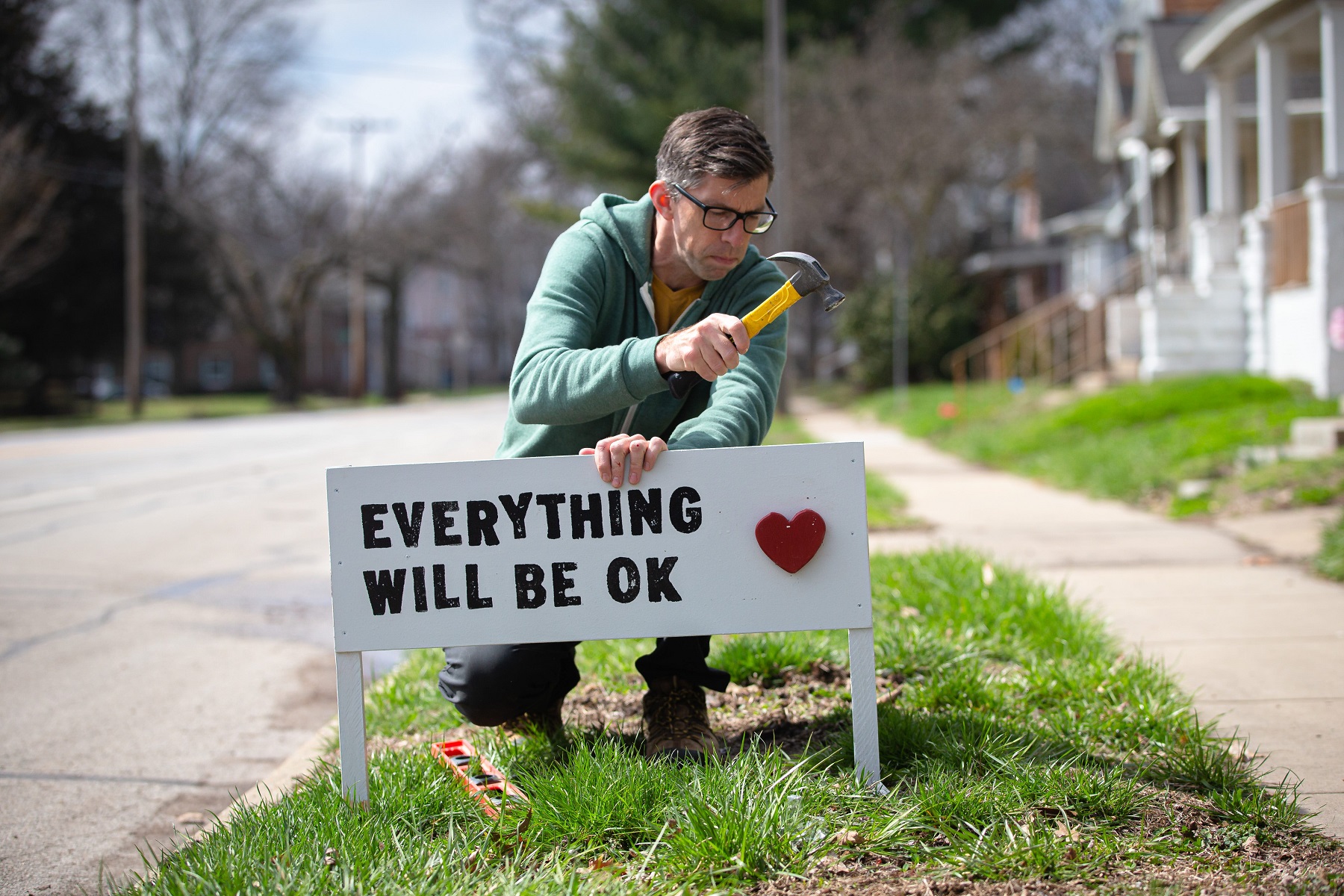Dave Heinzel installs one of his handmade signs with the saying &quot;Everything Will Be Ok&quot; along with a 3D red heart that he he handmade in response to the COVID-19 pandemic in front of a home on West Lawrence Avenue, Wednesday, March 25, 2020, in Springfield, Ill. Heinzel started taking requests for the signs on social media and the demand soared to over 200 requests. &quot;I really think everything will be okay,&quot; said Heinzel. &quot;It&#039;s going to get worse and it&#039;s not going to be fun and we&#039;re going to lose people we know, but it will be okay.&quot;Usp News Coronavirus A Usa Il