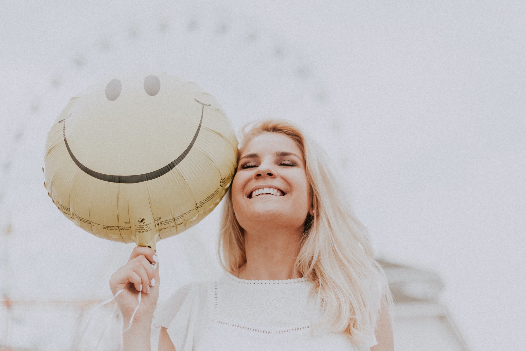 1600 Woman Holding a Smiley Balloon from Pexels Heather J Crider Article On Intention Being Your Superpower