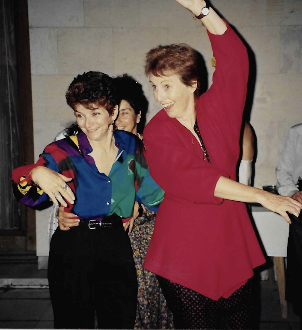 Sylvia Spring, filmmaker and co-founder of MediaWatch dancing with then Executive Director, Meg Hogarth at a women&#039;s event in Bulgaria 1994. Meg died last month in Toronto at 84.