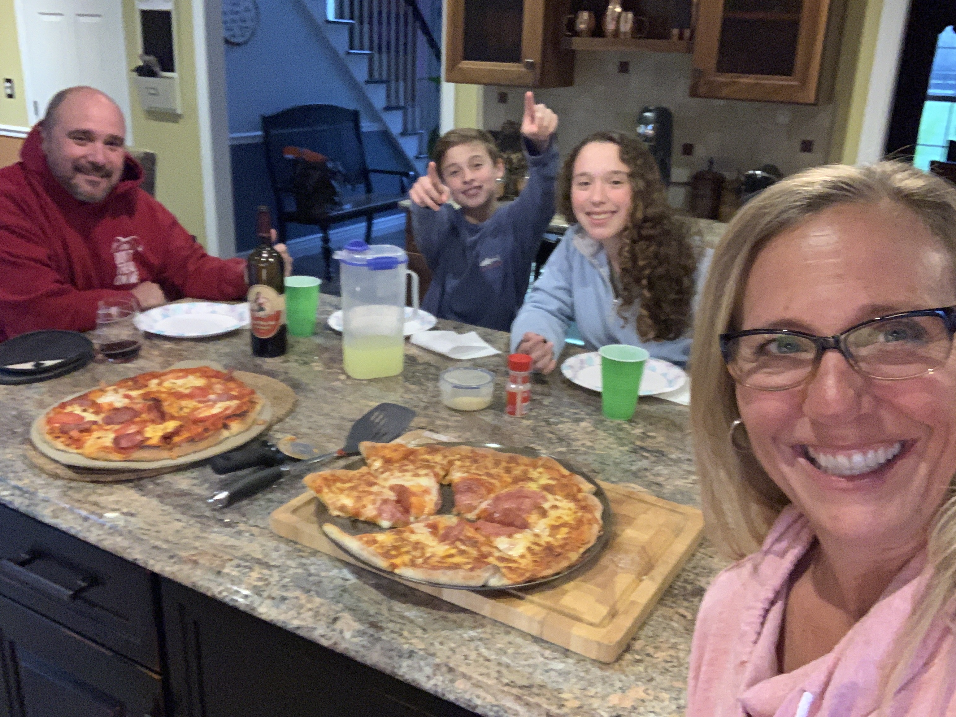 Ramalho Family Enjoying Homemade Pizza
