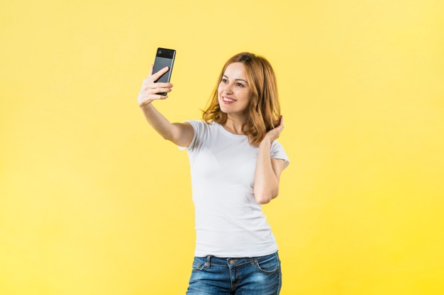 https://content.thriveglobal.com/wp-content/uploads/2020/05/selfie-girl.jpg
