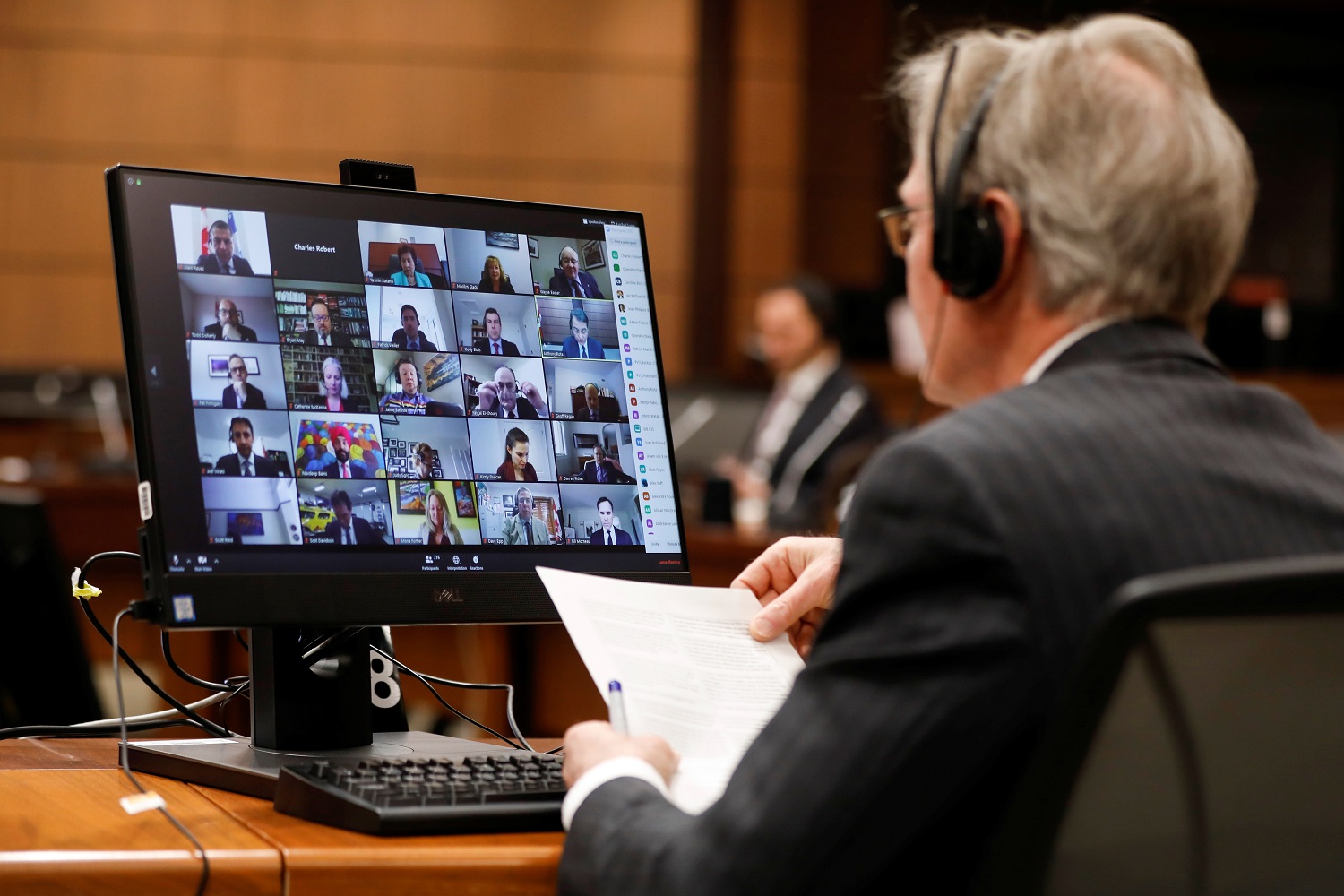 Canadian Members of Parliament, displayed on a computer monitor, attend the first virtual meeting of the special committee on the COVID-19 pandemic, as efforts continue to slow the spread of the coronavirus disease (COVID-19), on Parliament Hill in Ottawa, Ontario, Canada April 28, 2020. REUTERS/Blair Gable