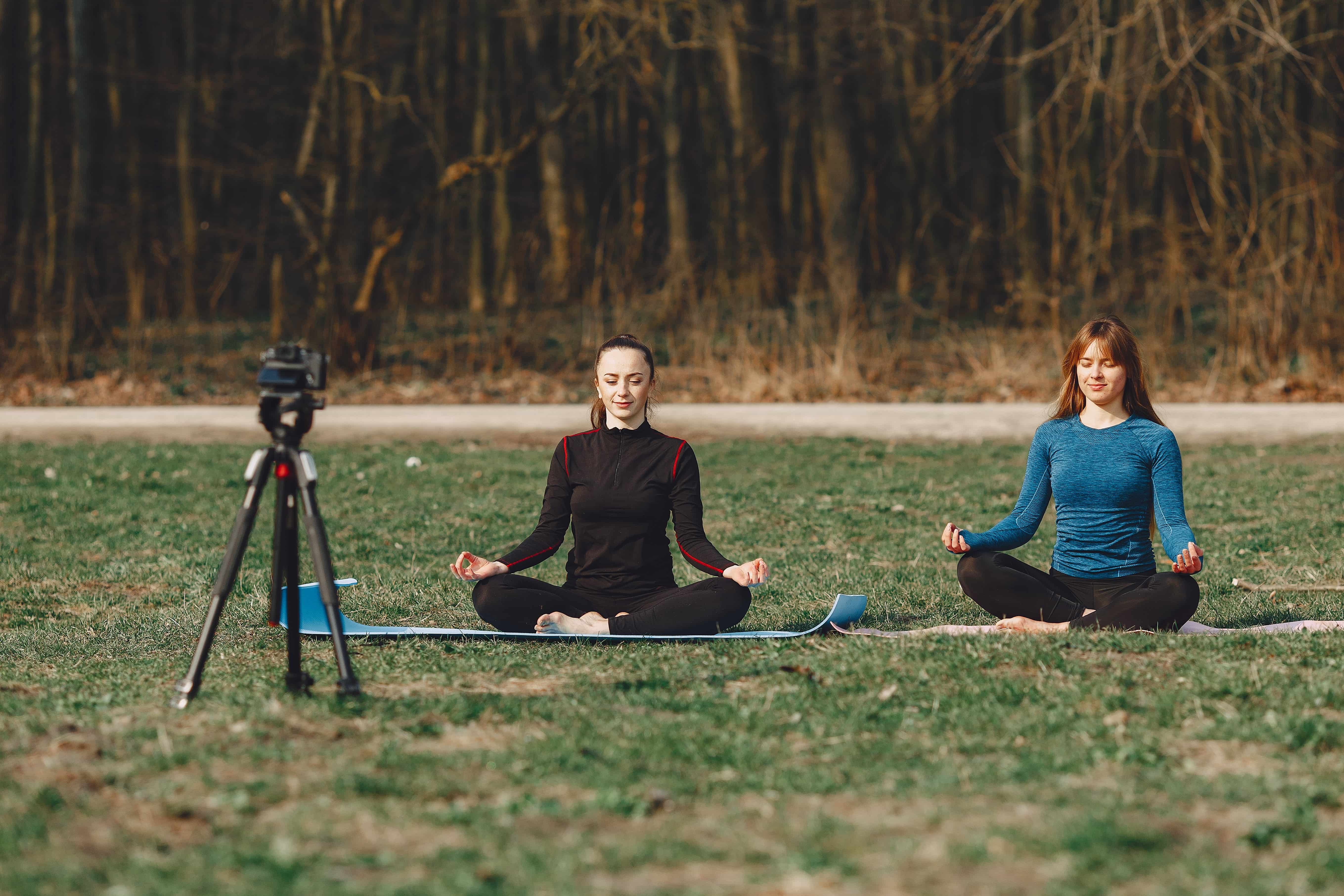 2 inspirational girls vlogging while meditating