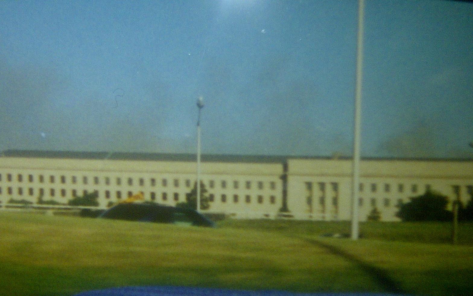 The Pentagon as smoke billows after the crash of Flight 77 Photo Credit: Melissa DeCastro