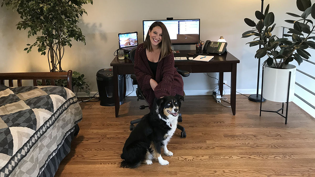 VP of Key Accounts at VMG Studios, Alysia Lee, in her home office with her dog Penny