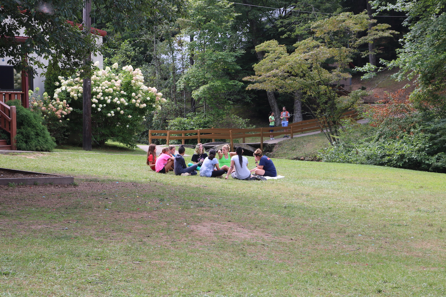 A sharing circle at Experience Camps.  
