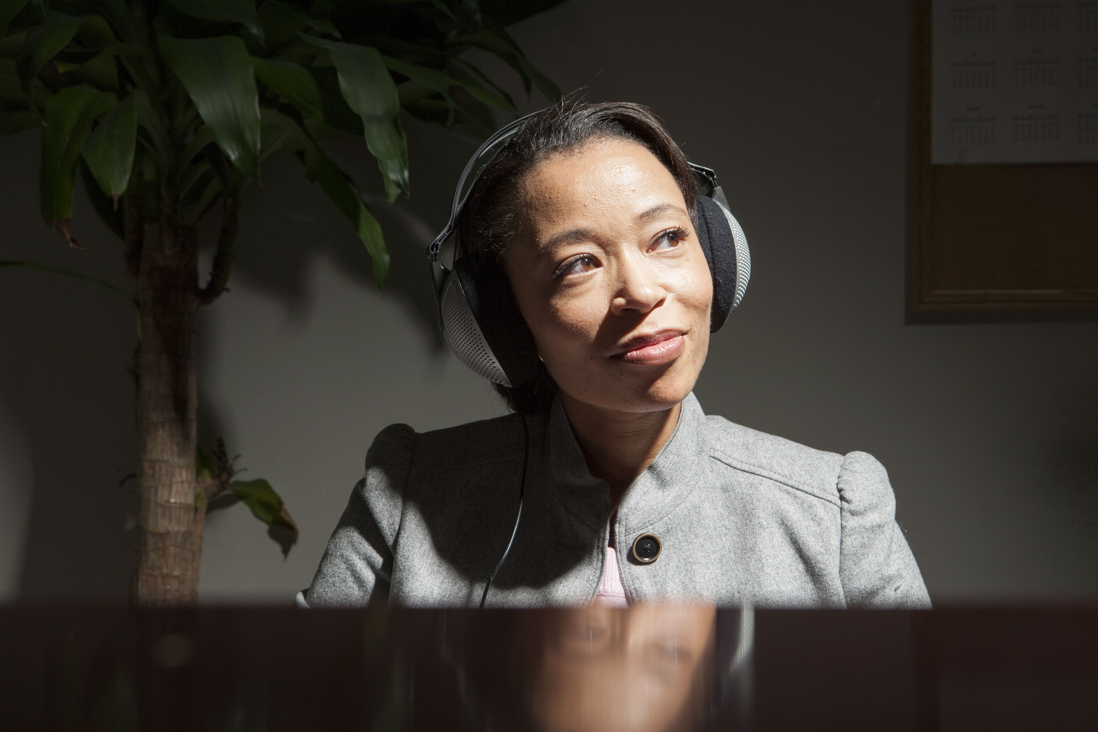 Business woman listening to music