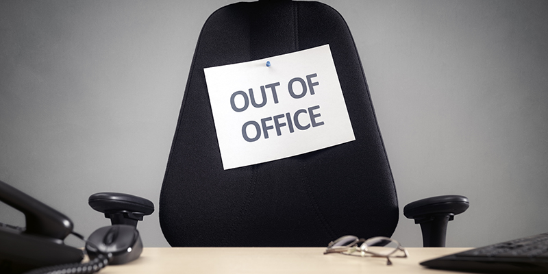 Business chair with out of office sign concept for vacation, holiday, lunch break or work life balance