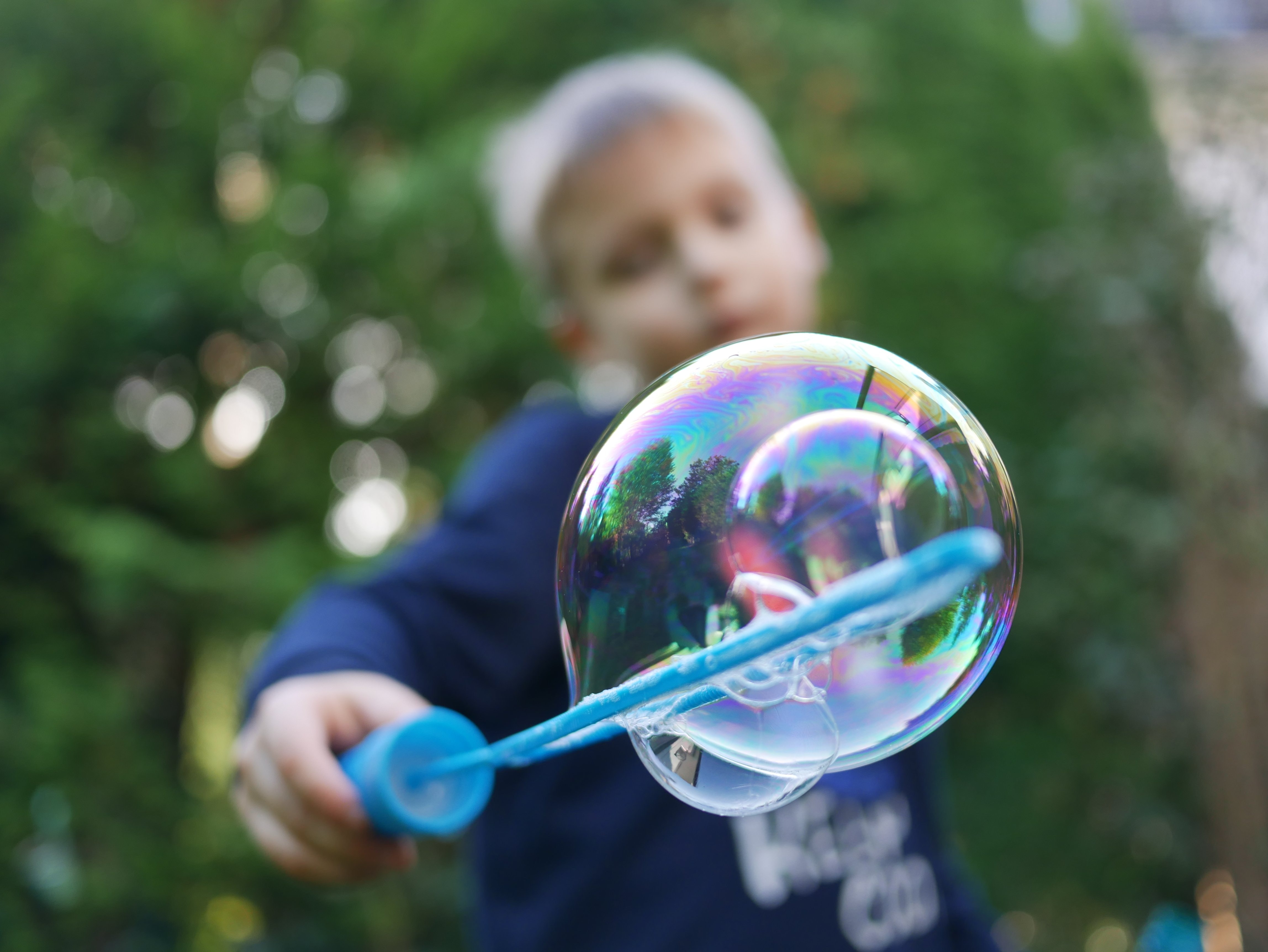 A child blowing soap bubbles helped change my life