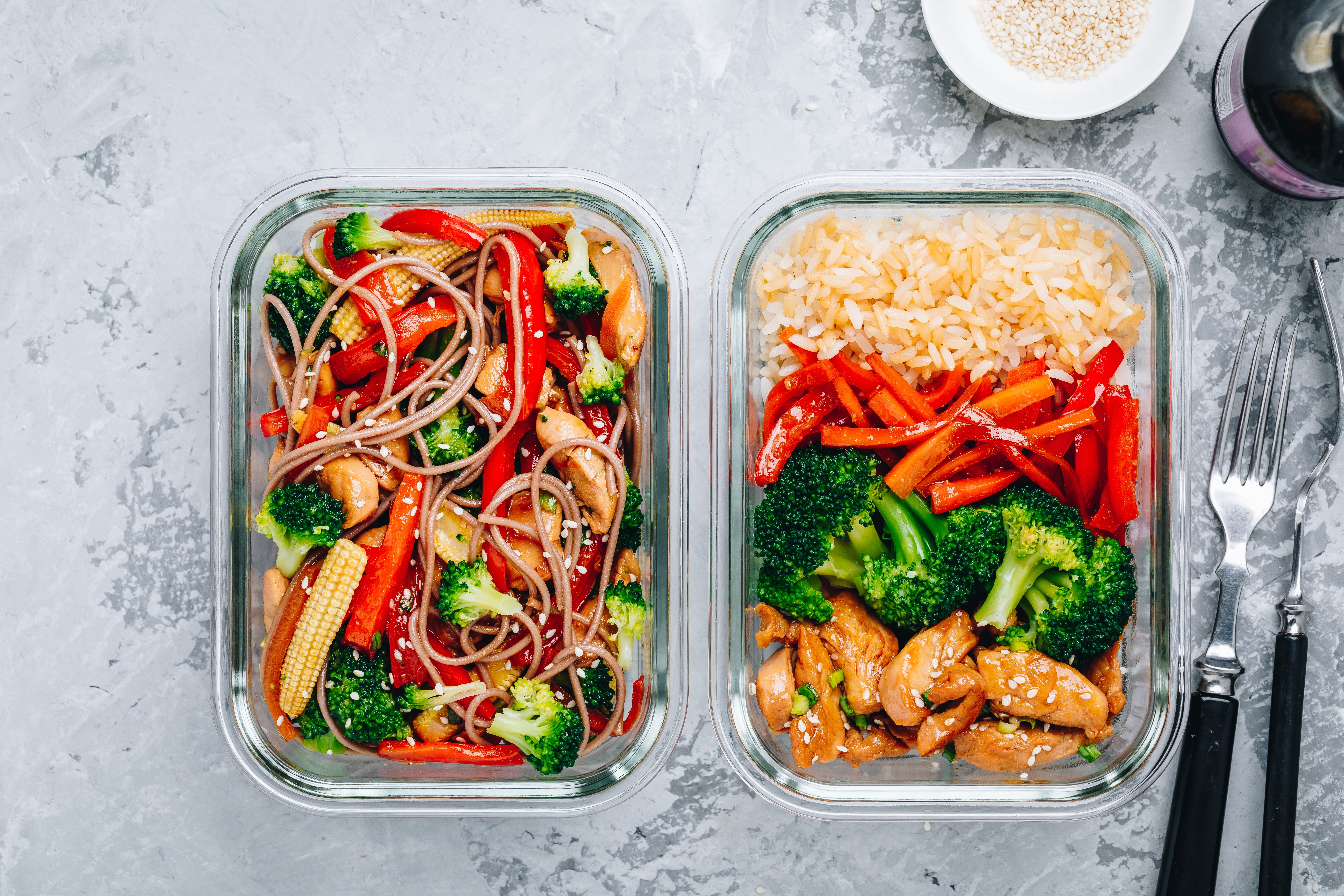 Chicken teriyaki stir fry meal prep lunch box containers with broccoli, carrots, rice or soba noodles