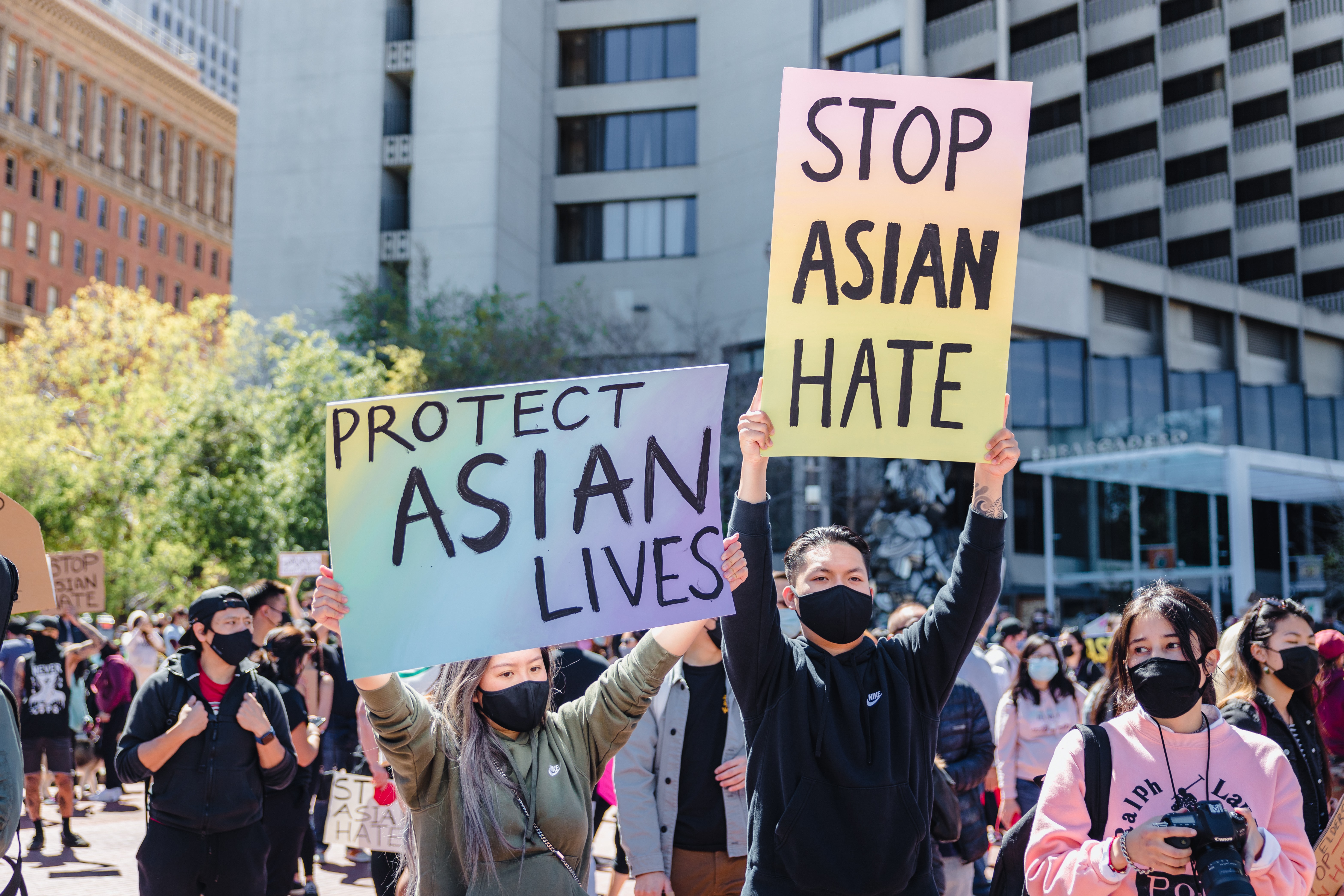 Stop Asian Hate and Protect Asian Lives Signs at a rally