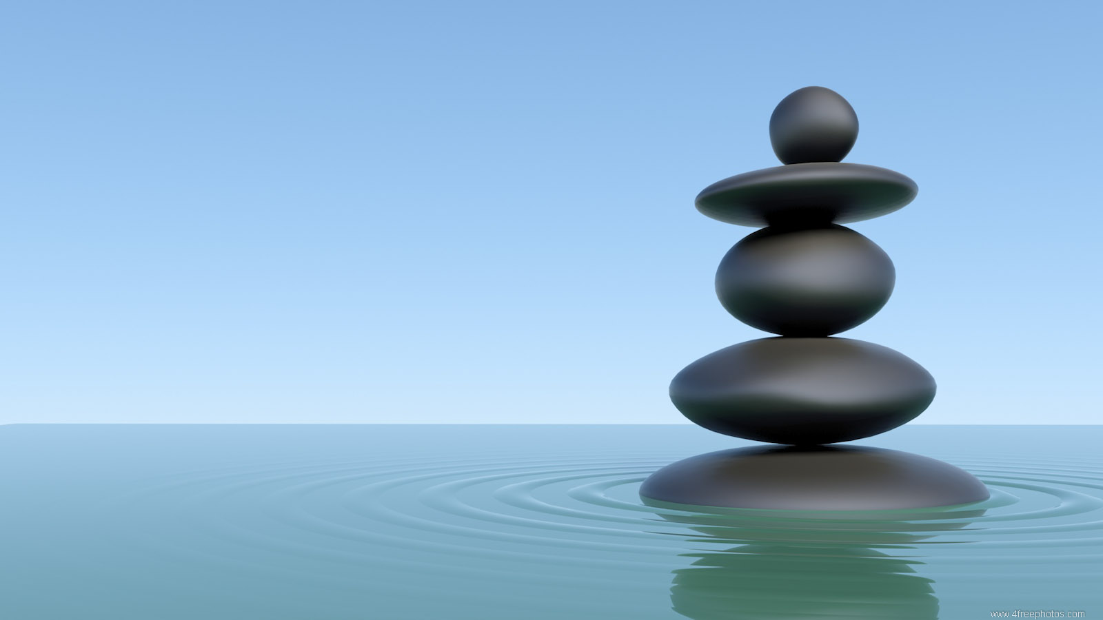 Zen stones piled in water
