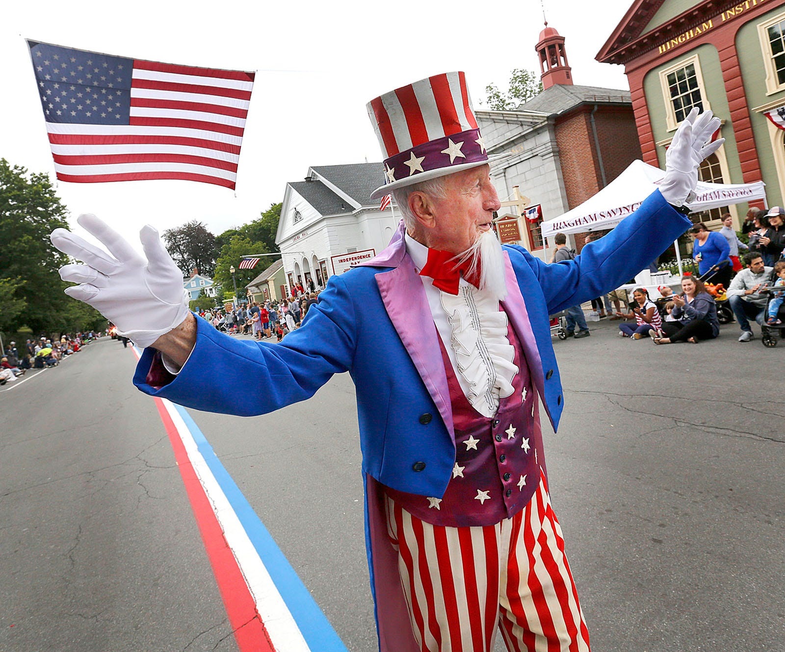 LEAD IMAGEUncle Sam- George Ford-82 leads the parade.The annual July 4th parade in Hingham Square on Sunday July 4, 2021 Greg Derr/The Patriot Ledger070421 Gd Hin Parade13 Jpg