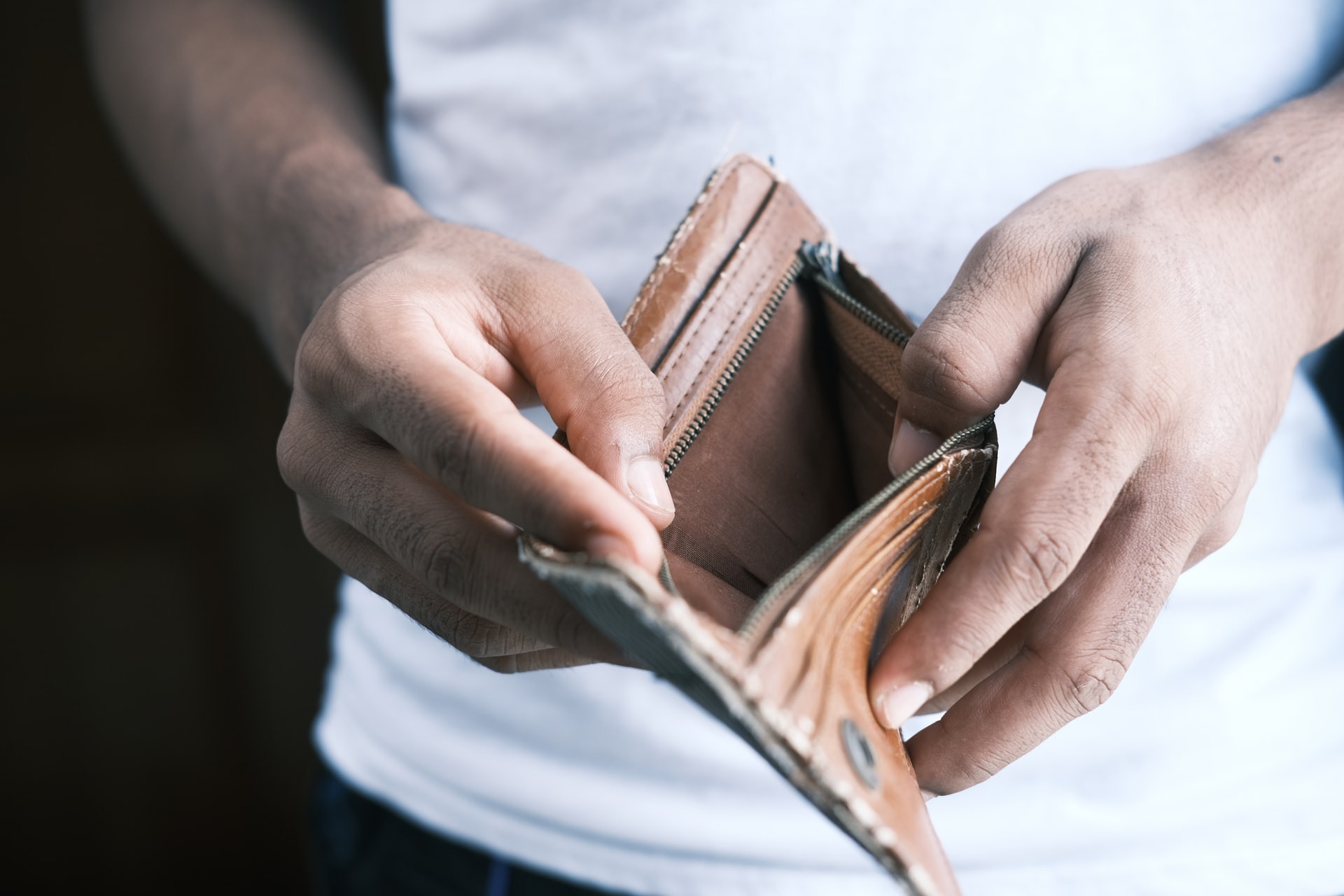 person holding wallet