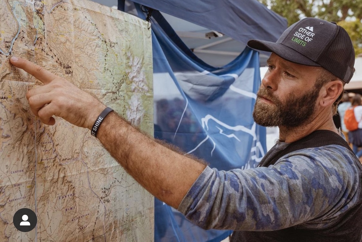 Helgi Olafson studies the map during his 2,855 mile Trans Triple Crown adventure. Photo by Nathaniel Bailey Photography.