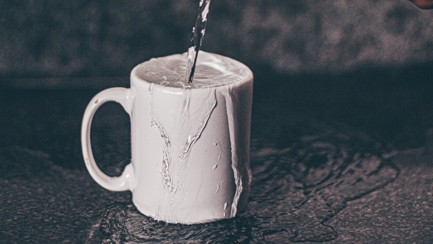 Photo by Luis Pimenttel: https://www.pexels.com/photo/person-pouring-water-on-white-ceramic-mug-9635654/